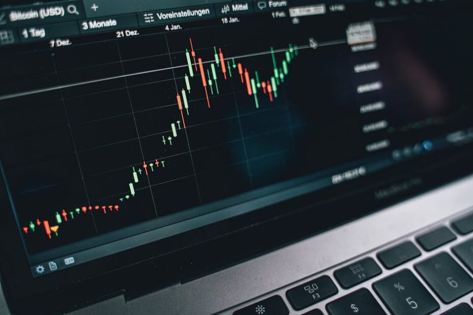 Close-up of a computer screen displaying cryptocurrency market trends and data.